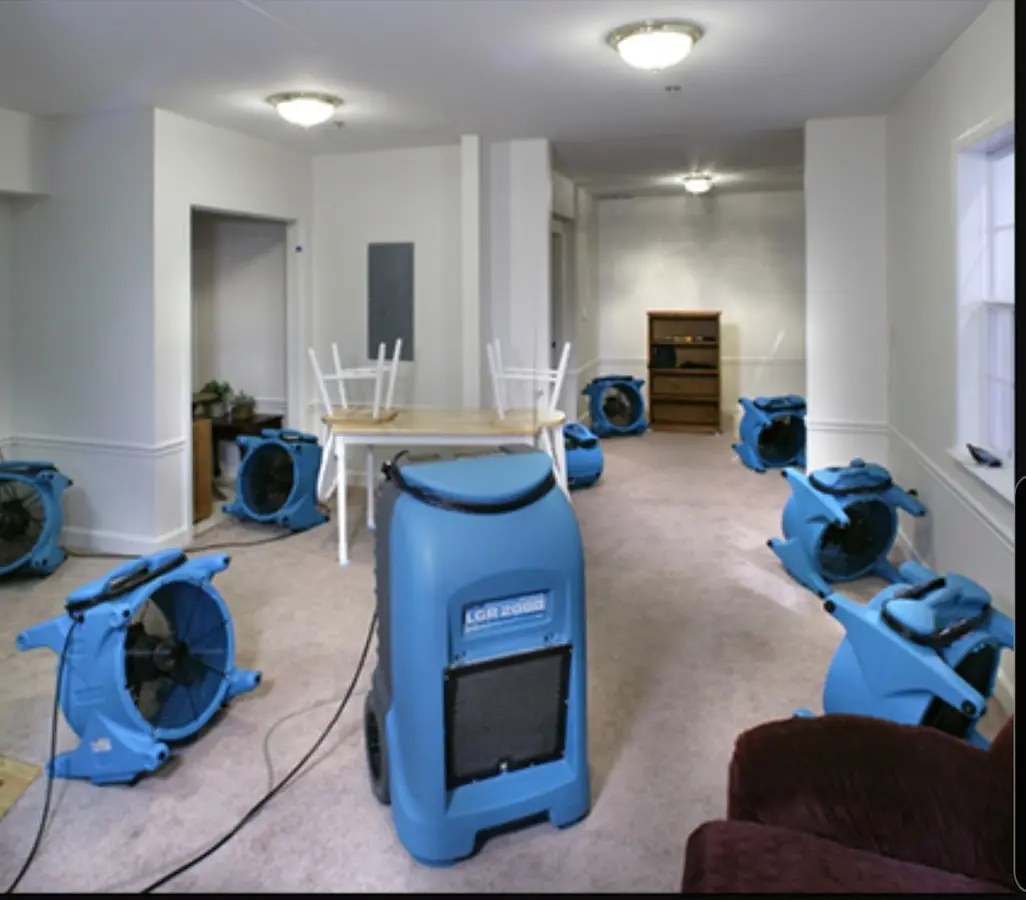 Air movers and dehumidifier setup for Water Damage Restoration in Stevensville
